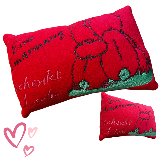 Bild von „Eine Umarmung schenkt Liebe“ – Kissen voller Wärme und Geborgenheit